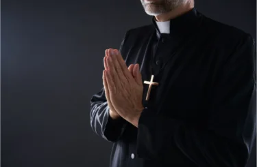 Praying Hands Priest