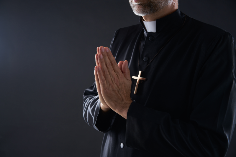Praying Hands Priest
