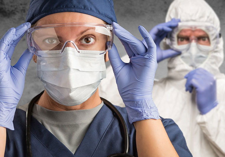 Female and Male Doctors or Nurses Wearing Scrubs and Protective Mask and Goggles Banner.