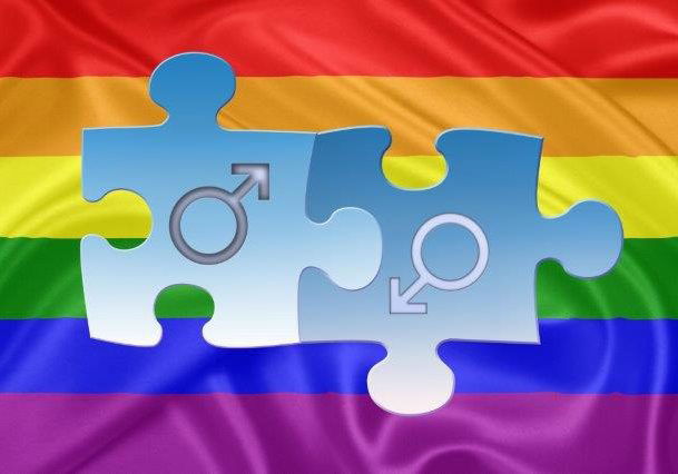 Same - sex marriages: Rainbow gay Flag and a puzzle represanting a male couple